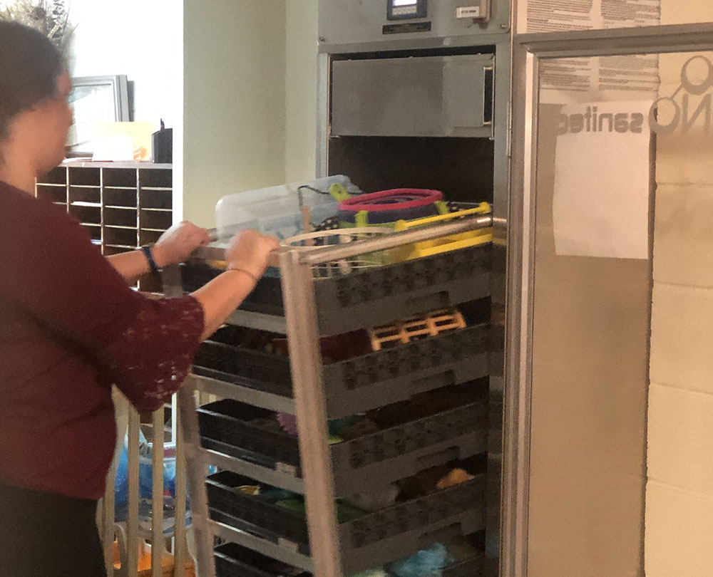 teacher and ZONO machine at a Preschool & Daycare Serving Brighton, MI