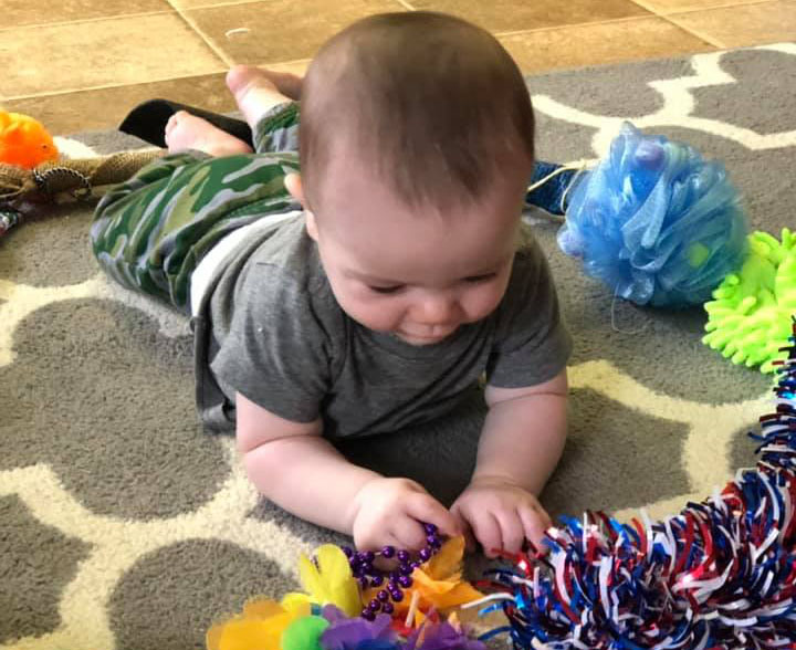 baby playing at a Preschool & Daycare Serving Brighton, MI