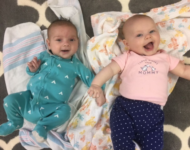 cute babies smiling at a Preschool & Daycare Serving Brighton, MI