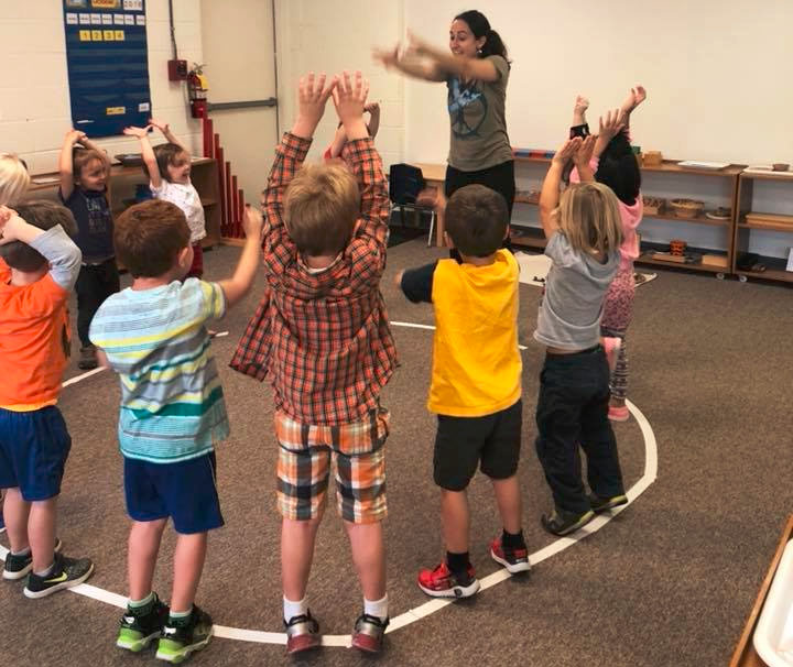 happy kids participating in class at a Preschool & Daycare Serving Brighton, MI