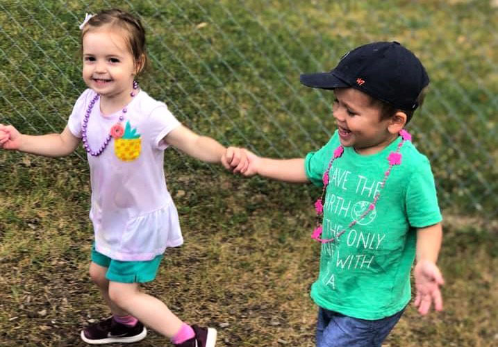 happy kids playing together at a Preschool & Daycare Serving Brighton, MI